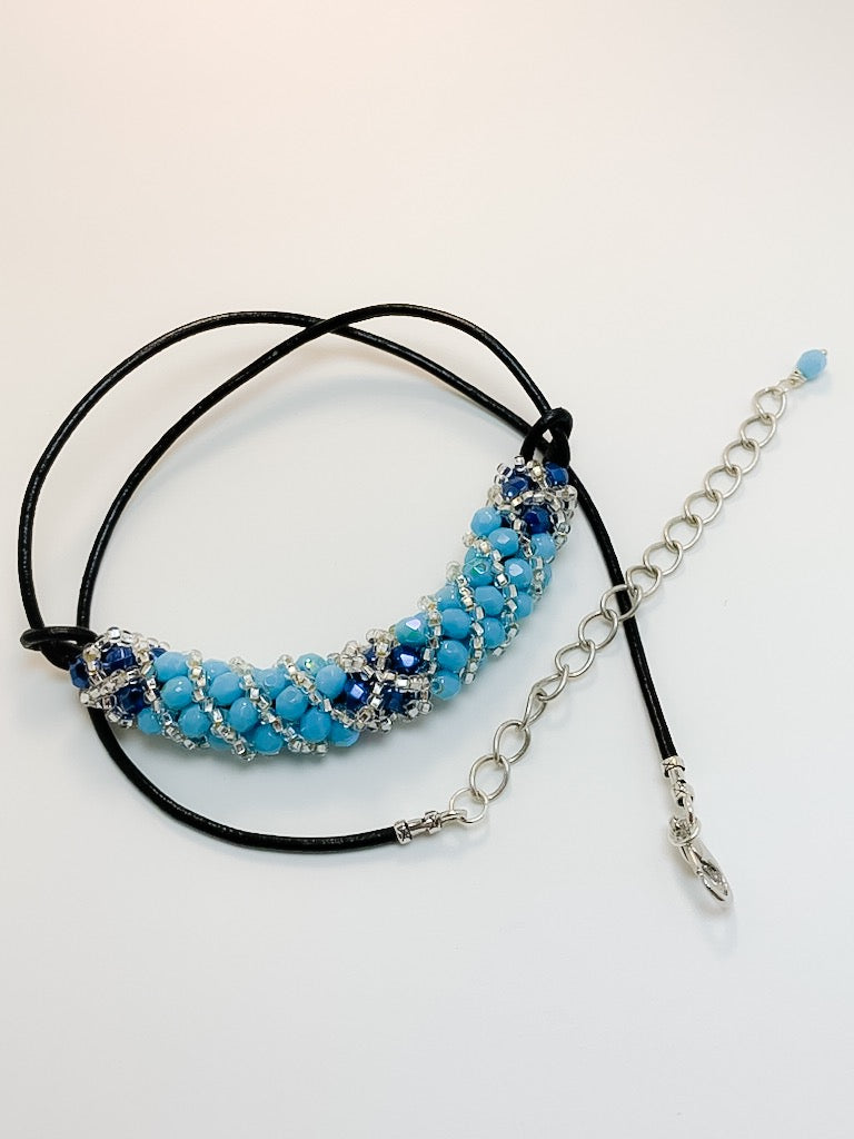 Blue Crystals and Silver Seed Beads woven Necklace on Leather Cord