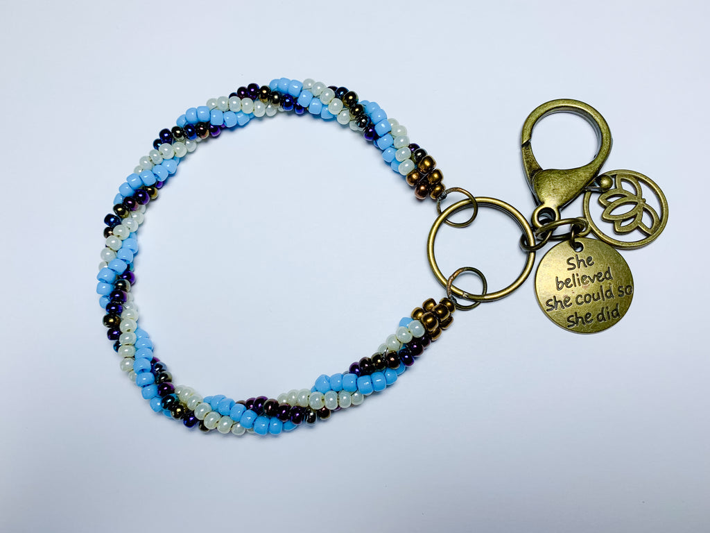 Affirmation Key Keeper in Spiral Herringbone with Bronze, Cream, Oil Spill and Light Blue Seed Beads