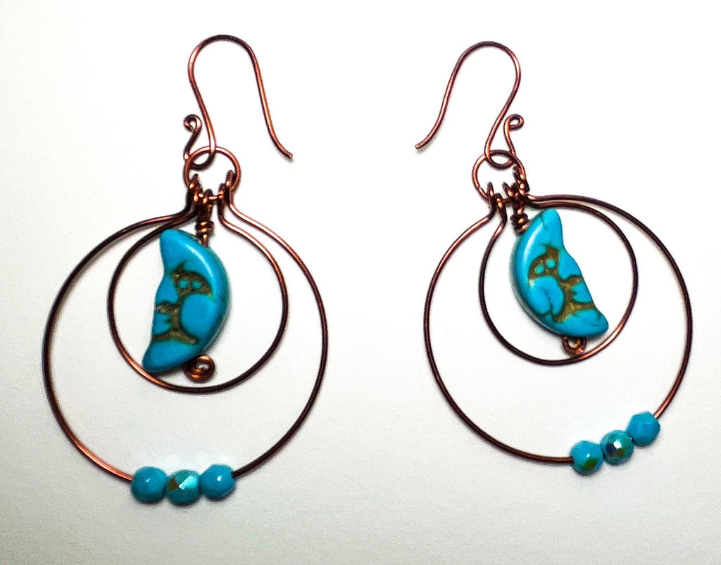 Turquoise colored Moon charms in antiqued Copper wire wrapped hoop earrings