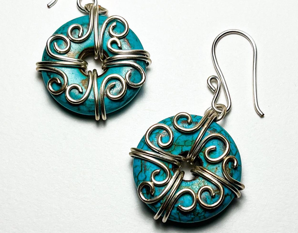 Turquoise colored round charms wire wrapped earrings